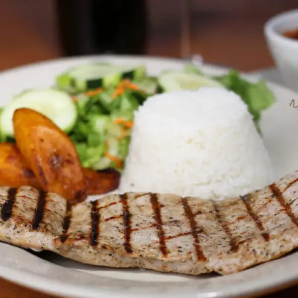 Lomo de cerdo asado o en salsa criolla